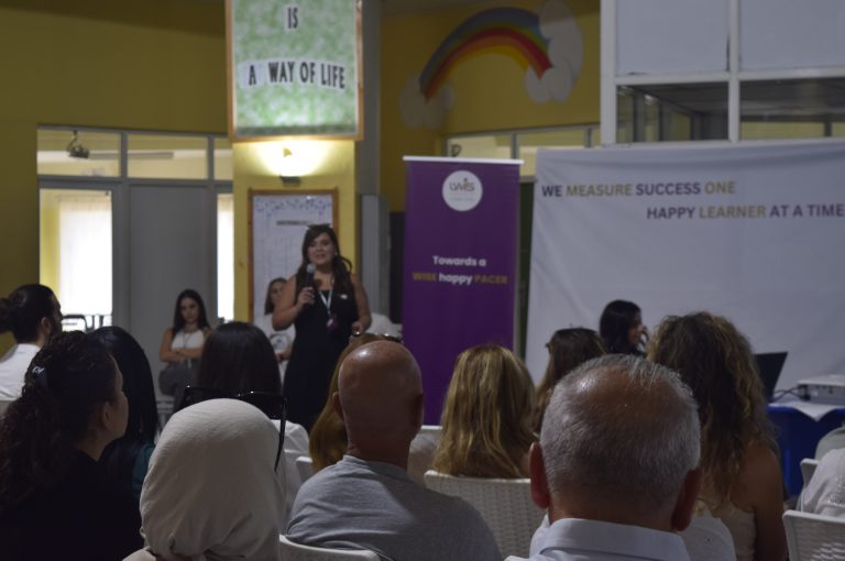 LWIS-AiS parents participating in an orientation session with the school leadership, discussing the school’s vision, academic expectations, and ways to support students’ learning and growth.