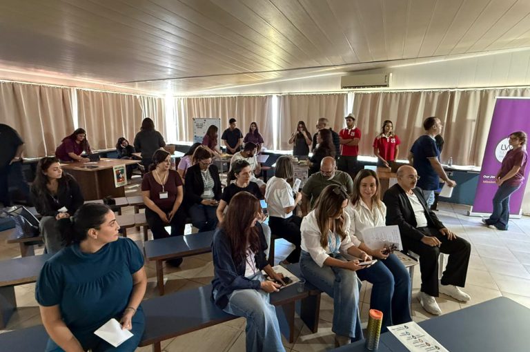 IBDP students at LWIS-AiS Upper Campus presenting and discussing their projects during the Gallery Walk in Lebanon.