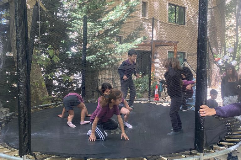 LWIS-AiS students, parents, and staff participating together in a trip to Faraya, enjoying outdoor activities and moments of connection that reflect the school’s strong sense of community.
