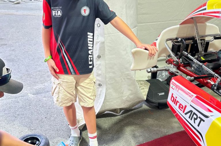Alex Noah Mghabghab from LWIS-AiS holding his trophy after winning 1st place at the MENA Karting Competition in Qatar – representing Lebanon with pride.