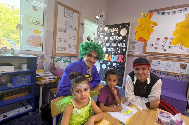 “IB DP Year 1 students from LWIS-AiS celebrating Halloween with KG1–KG3 children through crafts, games, and storytelling – fostering creativity, empathy, and service.”