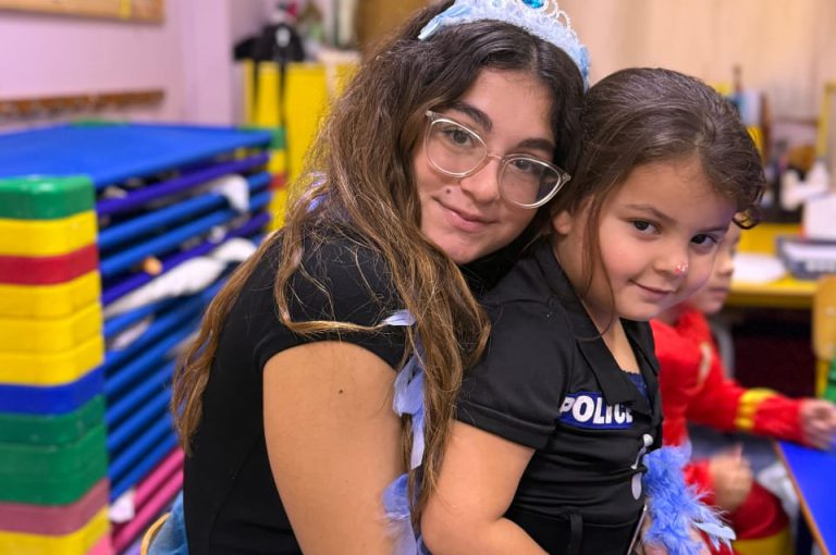 “IB DP Year 1 students from LWIS-AiS celebrating Halloween with KG1–KG3 children through crafts, games, and storytelling – fostering creativity, empathy, and service.”