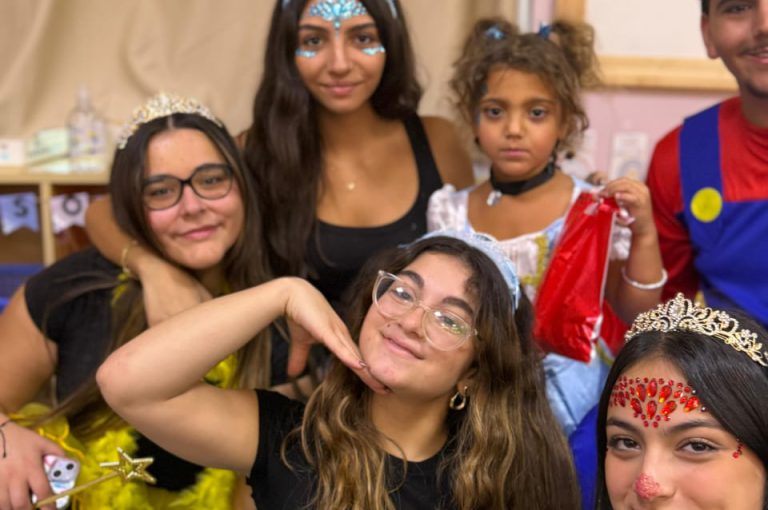 “IB DP Year 1 students from LWIS-AiS celebrating Halloween with KG1–KG3 children through crafts, games, and storytelling – fostering creativity, empathy, and service.”