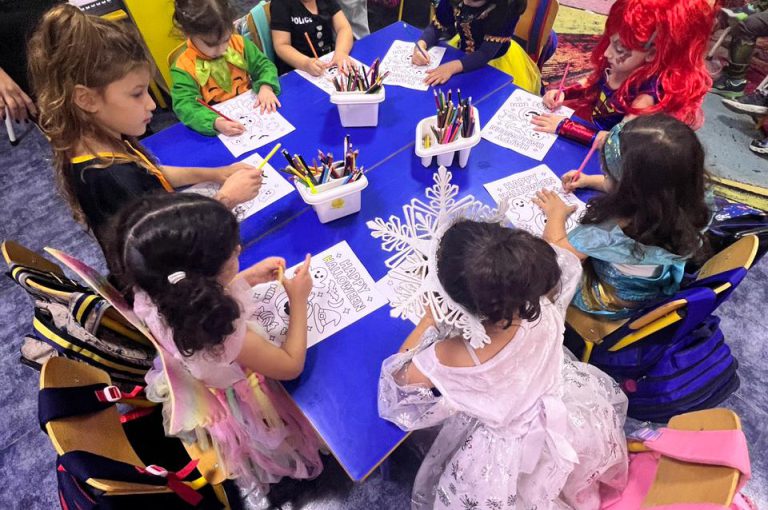 “IB DP Year 1 students from LWIS-AiS celebrating Halloween with KG1–KG3 children through crafts, games, and storytelling – fostering creativity, empathy, and service.”