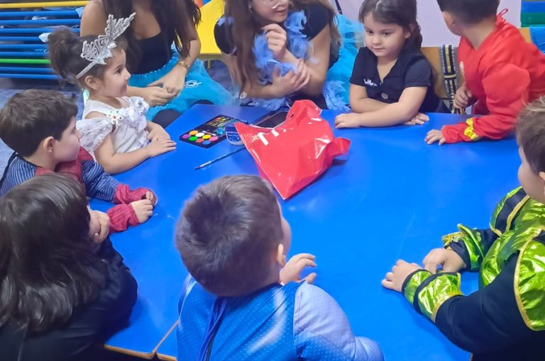 “IB DP Year 1 students from LWIS-AiS celebrating Halloween with KG1–KG3 children through crafts, games, and storytelling – fostering creativity, empathy, and service.”
