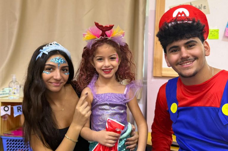 “IB DP Year 1 students from LWIS-AiS celebrating Halloween with KG1–KG3 children through crafts, games, and storytelling – fostering creativity, empathy, and service.”