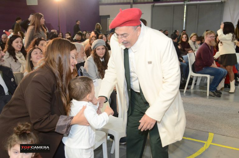 The Christmas show with students in colorful costumes.