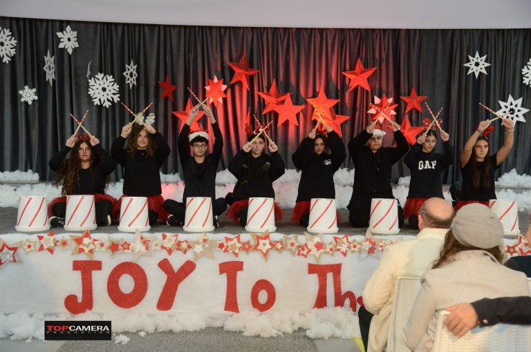 The Christmas show with students in colorful costumes.