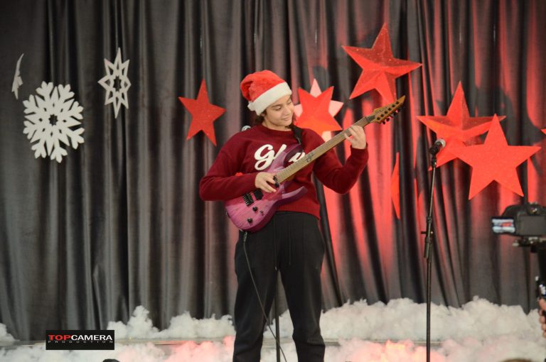 The Christmas show with students in colorful costumes.