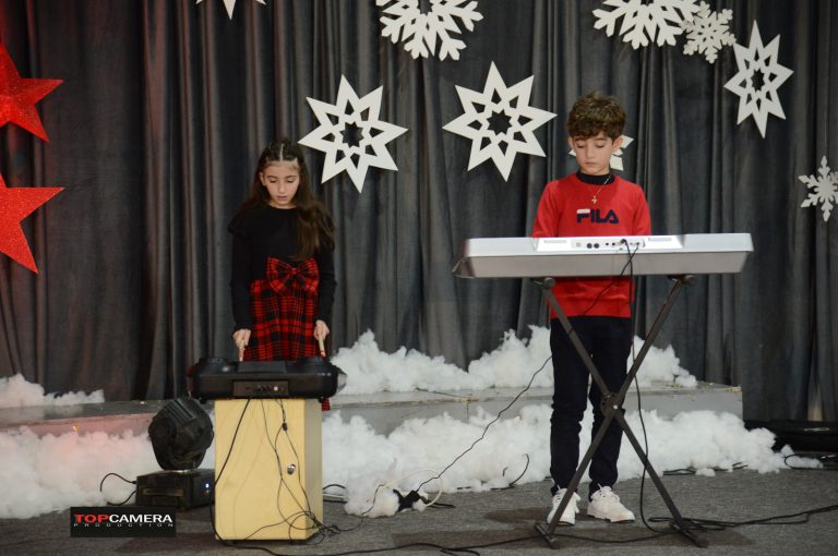 The Christmas show with students in colorful costumes.