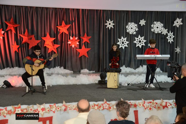 The Christmas show with students in colorful costumes.