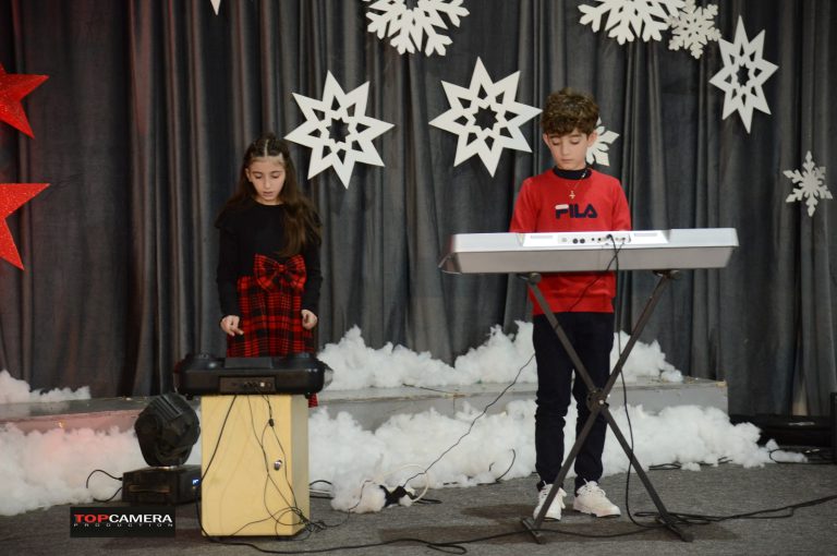 The Christmas show with students in colorful costumes.