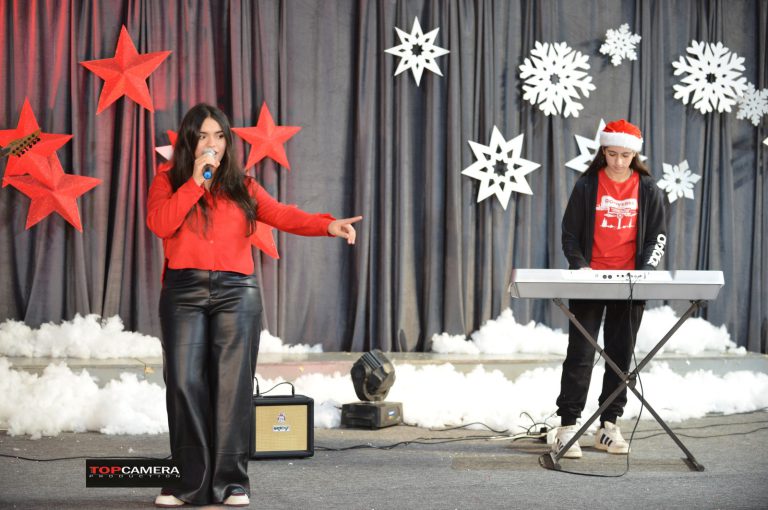 The Christmas show with students in colorful costumes.