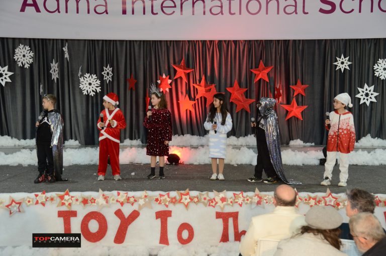 The Christmas show with students in colorful costumes.