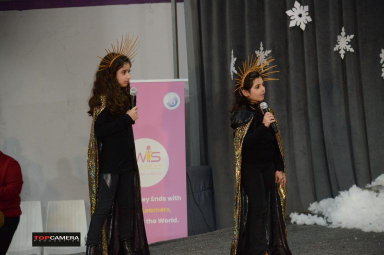 The Christmas show with students in colorful costumes.The Christmas show with students in colorful costumes.