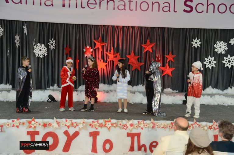 The Christmas show with students in colorful costumes.
