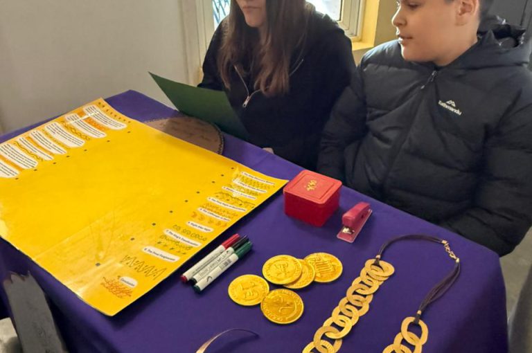Students from the Middle and Senior School attending the HLSS Fair at the Upper Campus during the Arabic Night theme, with traditional decorations, cultural outfits, and festive activities.