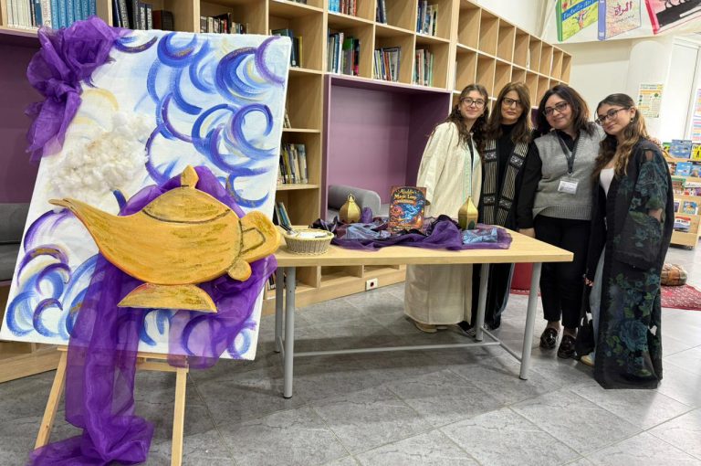 Students from the Middle and Senior School attending the HLSS Fair at the Upper Campus during the Arabic Night theme, with traditional decorations, cultural outfits, and festive activities.