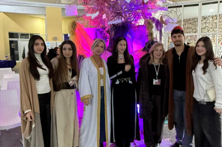 Students from the Middle and Senior School attending the HLSS Fair at the Upper Campus during the Arabic Night theme, with traditional decorations, cultural outfits, and festive activities.