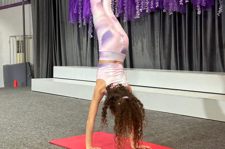 Lower School students performing various acts on stage during a talent show.