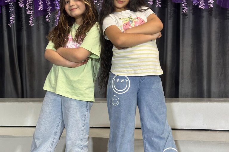 Lower School students performing various acts on stage during a talent show.