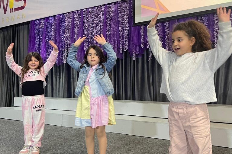 Lower School students performing various acts on stage during a talent show.