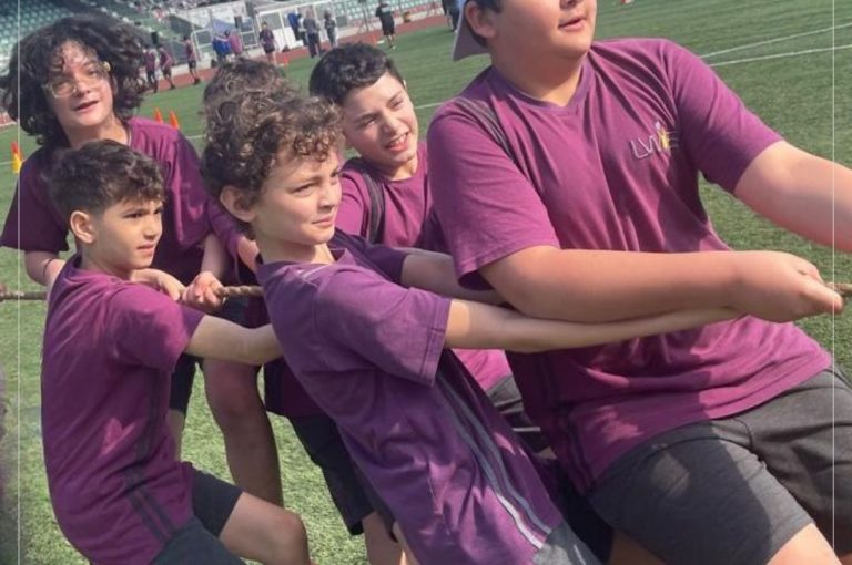 Students at LWIS Adma International School taking part in Sports Day activities through collaboration with Miami Fitness Factory, combining fitness, fun, and teamwork.