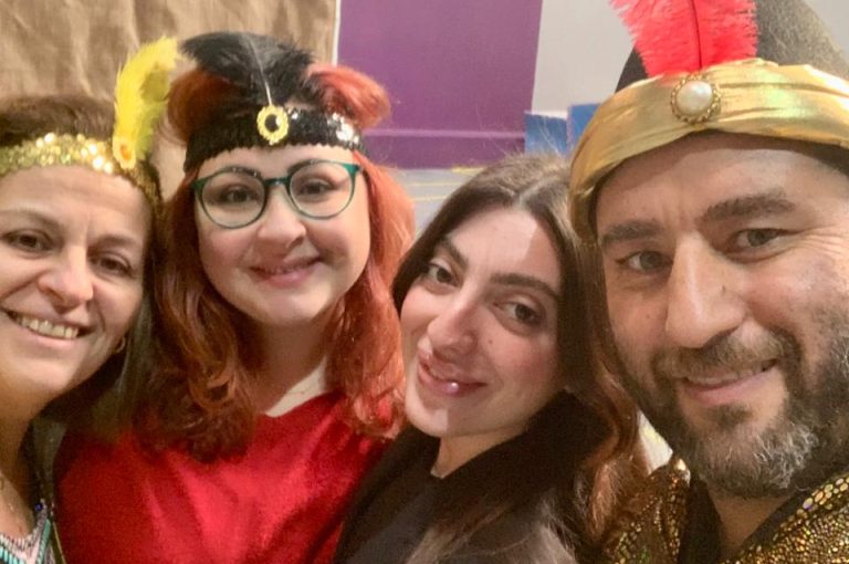 Teachers in costumes celebrating and interacting during Barbara Day at the lower campus