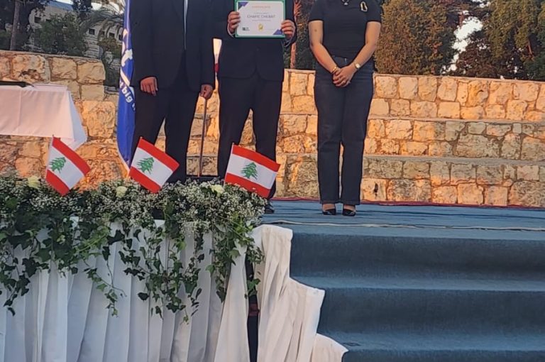 Jeya Geagea, Wendy Sleiman, and Chafic Chbat representing their school at the Future Debate Masters competition, achieving Top 4 in their first participation with a strong debate on population control, showcasing confidence, teamwork, and public speaking excellence.