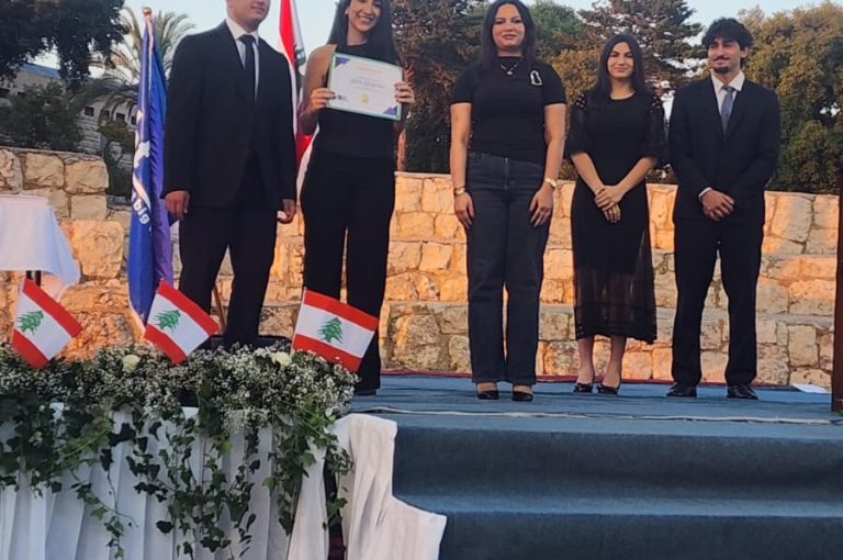 Jeya Geagea, Wendy Sleiman, and Chafic Chbat representing their school at the Future Debate Masters competition, achieving Top 4 in their first participation with a strong debate on population control, showcasing confidence, teamwork, and public speaking excellence.