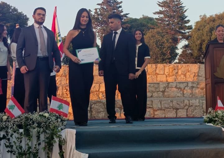 Jeya Geagea, Wendy Sleiman, and Chafic Chbat representing their school at the Future Debate Masters competition, achieving Top 4 in their first participation with a strong debate on population control, showcasing confidence, teamwork, and public speaking excellence.