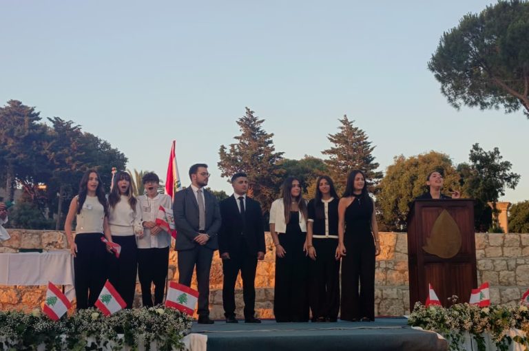Jeya Geagea, Wendy Sleiman, and Chafic Chbat representing their school at the Future Debate Masters competition, achieving Top 4 in their first participation with a strong debate on population control, showcasing confidence, teamwork, and public speaking excellence.